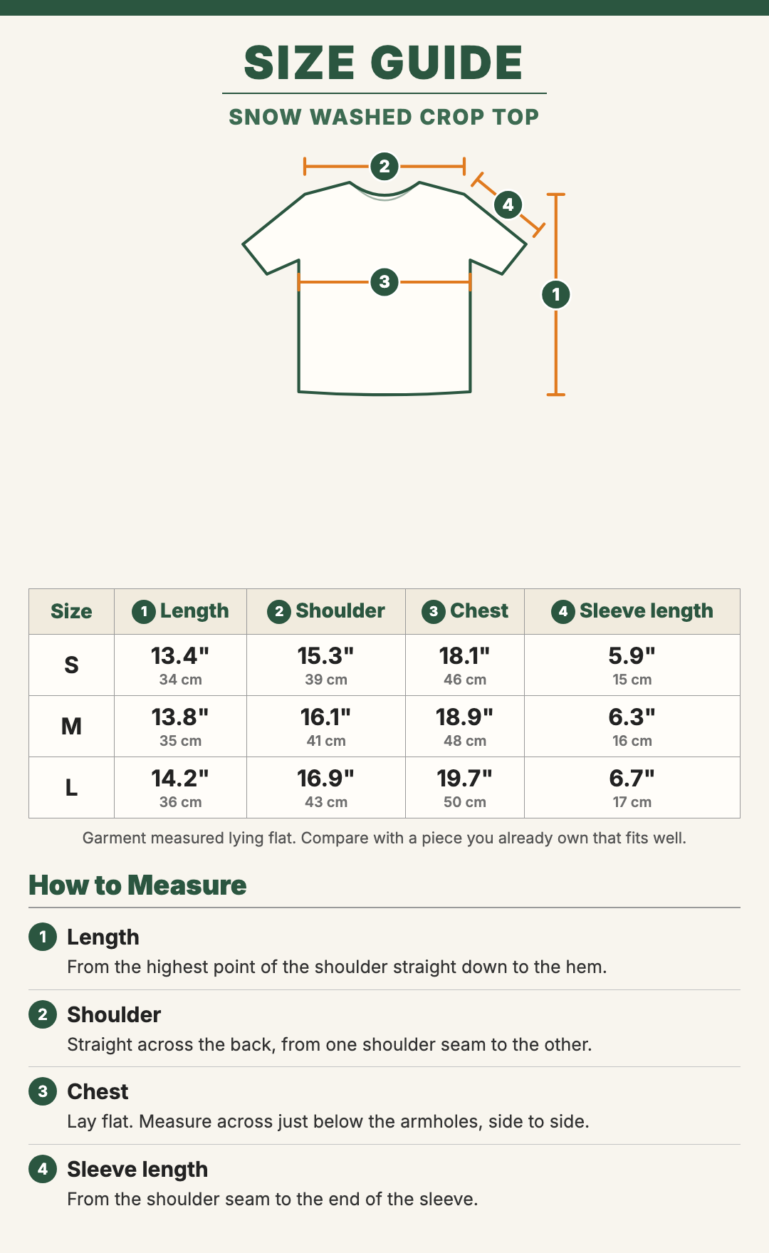 Snow Washed Crop Top size guide with a drawing showing where each measurement is taken