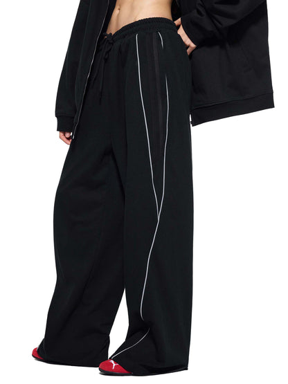 Vinyl Love Reflector Sweatpants in Red detail view by Rave Uniform